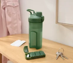 Getränkeflasche mit Pillendose