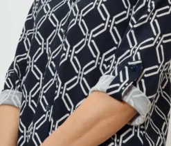 Piqué-Jerseybluse, dunkelblau-weißer Alloverprint