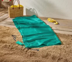 Sandfreie Stranddecke